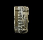 Indian Whitewashed Figure
8th-11th century AD. A composition architectural figure formed as a facing kilted male with swags of beads to the neck, swo...