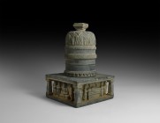 Buddhist Two-Part Limestone Temple
2nd-4th century AD. A carved limestone stupa with separate rectangular base, the stupa with lotus flower dome and ...