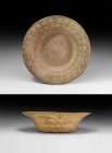 Indus Valley Mehrgarh Painted Fish Vessel with Raised Bosses
2nd millennium BC. A rare ceramic bowl with broad flared rim, inner face painted with a ...