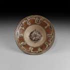 Islamic Inscribed Brown-Glazed Bowl
9th-10th century AD. A broad peach-coloured glazed ceramic bowl with broad band of calligraphic text to the outer...