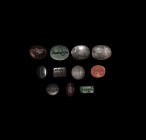 Islamic Gemstone Group
12th-13th century AD. A mixed group of plaques and cabochons in rock crystal, garnet, haematite and other stones each with a l...