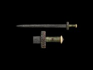Merovingian Sword with Garnet Inlaid Hilt
5th-6th century AD. A two-edged sword comprising a lentoid-section iron parallel-sided blade with broad poi...