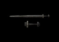 Viking Sword with Inlaid Silver Decorated Hilt
9th-10th century AD. A two-edged iron sword of Type X comprising a broad, flat blade with rounded poin...