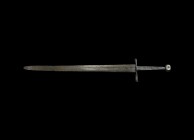 Medieval Two-Handed Sword
15th century AD. An iron longsword with thin two-edged blade and rounded tip, broad shoulder with S-curved tapering quillon...