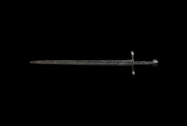 Medieval Broad Sword
14th-15th century AD. An iron sword comprising a broad triangular blade with rounded tip and fuller to the upper third of each f...