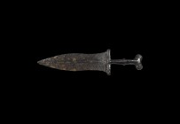 Roman Pugio Dagger
1st century BC-1st century AD. An iron two-edged pugio dagger with waisted blade, thick midrib, rectangular lower guard and lozeng...