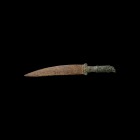 Roman Knife with Eagle-Head Grip
1st-3rd century AD. A military knife comprising a single-edged iron blade with scooped back, bronze hilt with volute...