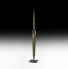 Western Asiatic Luristan 'Predator Type' Short Sword
1st millennium BC. A bronze short sword comprising a broad triangular two-edged blade with media...