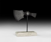 Viking Double-Bladed Axehead
9th-12th century AD. An iron axehead comprising a bulbous socket with baluster to each end, bearded blade with curved ed...