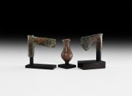 Western Asiatic Luristan Axehead and Macehead Collection
13th-7th century BC. A group of bronze items comprising: an axehead with tubular socket and ...