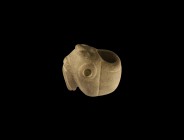 Western Asiatic Urartian Macehead
1st millennium BC. A carved limestone macehead with segmented body, zoomorphic details. 215 grams, 66mm (2 1/2"). P...
