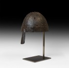 Viking Period Helmet with Nasal Guard
9th-10th century AD. A helmet fabricated from four triangular iron plates curved to conform to the human head, ...