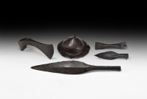 Merovingian Weaponry Group
5th-6th century AD. A group of iron weapon components comprising: a domed shield boss with central spike, broad flange wit...