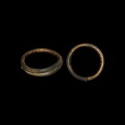 Very Large Bronze Age Decorated Arm-Ring
12th-8th century BC. A substantial central European arm-ring, round-section in form with overlapping ends an...