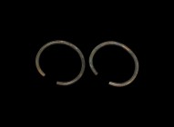 Bronze Age Decorated Arm-Ring Pair
2nd millennium BC. A matching pair of large arm-rings, both decorated with incised lines to the upper face with th...