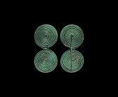 Bronze Age Spectacle Brooch
1st millennium BC. A spectacle brooch formed as two large tightly-wound coils with 8-shaped intermediate coils, remains o...