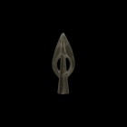 Bronze Age Pierced Socketted Spearhead
2nd millennium BC. A leaf-shaped spearhead with tubular socket extending to the tip of the blade, the blade wi...