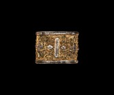 Viking or Carolingian Gold Chip-Carved Sword Belt Mount
9th century AD. A silvered and gilded cast copper-alloy sword belt mount, rectangular in plan...