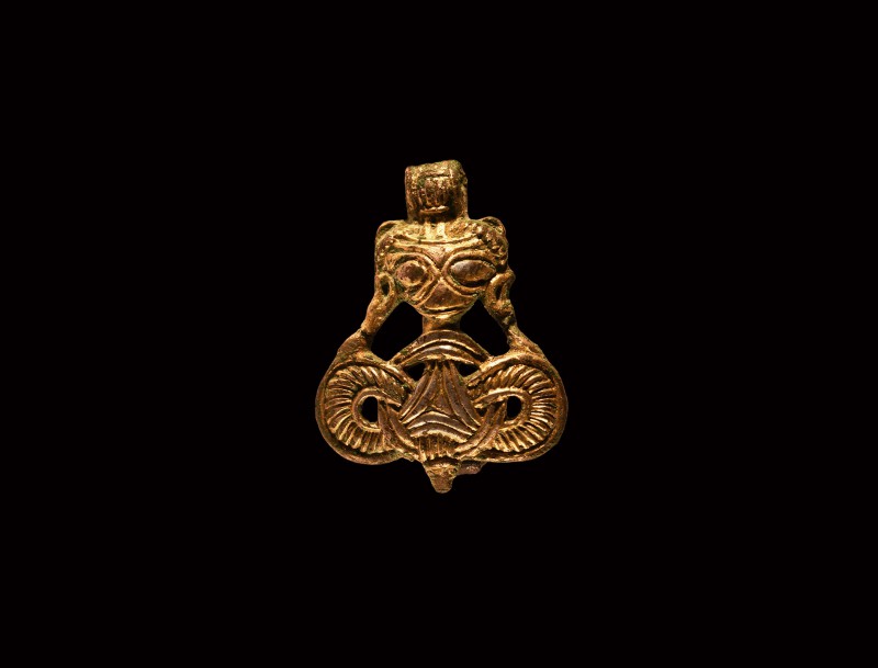 Viking Gilt Silver Beast Pendant
9th-11th century AD. A silver-gilt pendant com...
