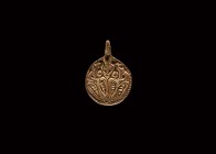 Viking Gilt Silver Odin and Ravens Pendant
9th-10th century AD. A silver-gilt discoid pendant with integral loop, pelletted border enclosing a low-re...