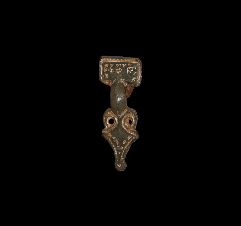 Anglo-Saxon Chip-Carved Brooch
6th-7th century AD. A beautiful small gilt bronz...