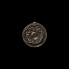 Saxon Patrix Brooch Die with Waves Design
6th century AD. A bronze patrix die with raised rim and central void, band of running scrolls within border...
