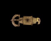 Large Gothic Gilt Silver Buckle with Raven and Eagle Heads
5th century AD. A parcel-gilt silver buckle comprising: a crescent loop with bird-head fin...