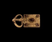 Gothic Gilt Silver Buckle with Garnets
6th century AD. A silver-gilt buckle set comprising: broad loop with scroll detailing to the upper face, four ...