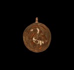 Large Medieval Gilt Heraldic Horse Harness Pendant with Swan
14th-15th century AD. A large gilt-bronze discoid harness pendant with integral suspensi...