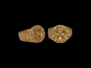 Post Medieval Gold Merchant's Signet Ring with Crossed Keys
16th century AD. A gold finger ring with discoid bezel, pelleted border around a heater s...