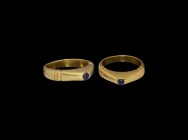 Medieval Gold Bishop's Stirrup Ring
13th-14th century AD. A heavy gold stirrup ring with flat-section hoop, ribbed collars to the shoulders, pyramida...
