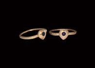 Medieval Gold Ring with Sapphire
13th-15th century AD. A gold finger ring comprising a round-section hoop with heart-shaped bezel, inset sapphire(?) ...