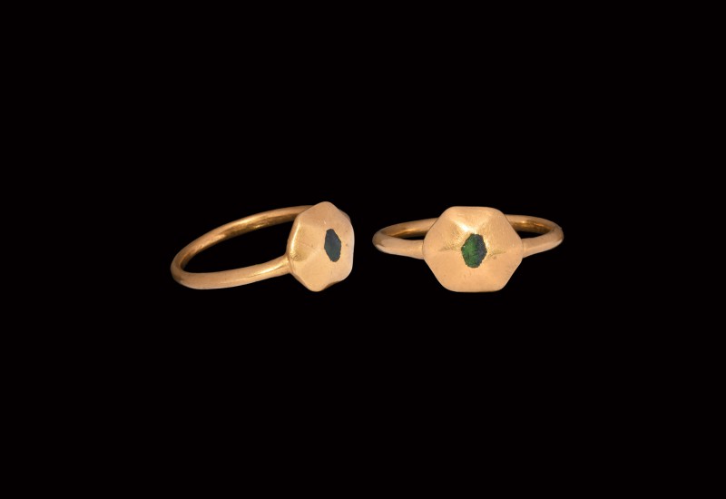 Medieval Gold Ring with Emerald
14th century AD. A gold finger ring comprising ...