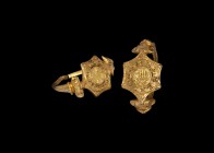 Post Medieval Gold Memento Mori Skull Ring
16th-early 17th century AD. A gold ring with thin hoop with expanding scrolled shoulders, traces of white ...