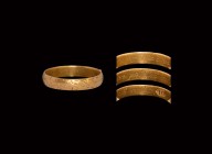 Post Medieval Gold 'Vertue Passeth Riches' Posy Ring
18th century AD. A gold posy ring with running foliage design to the outer face, legend in itali...