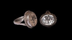 Post Medieval Silver Memento Mori Ring with Skeleton on Horseback
18th century AD. A silver finger ring with D-section hoop, bifid shoulders with not...