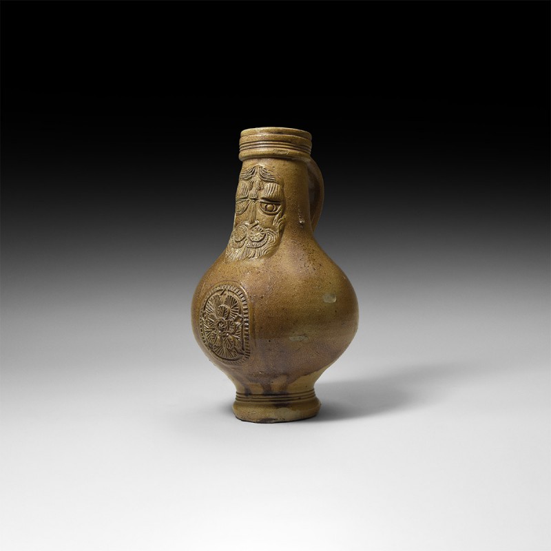 Post Medieval Bellarmine Jug
16th century AD. A salt-glazed stoneware jug of ba...