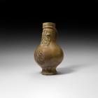Post Medieval Bellarmine Jug
16th century AD. A salt-glazed stoneware jug of bartmannskrug type with bulbous body, narrow tiered base, ribbed collar ...