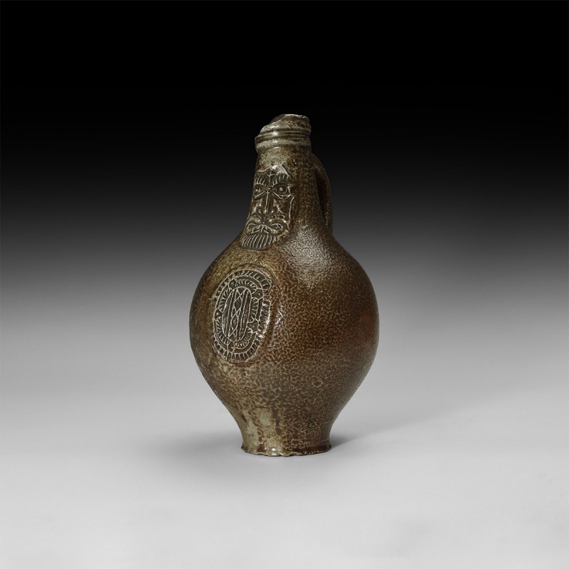 Post Medieval Bellarmine Jar
16th century AD. A salt-glazed stoneware jug of ba...