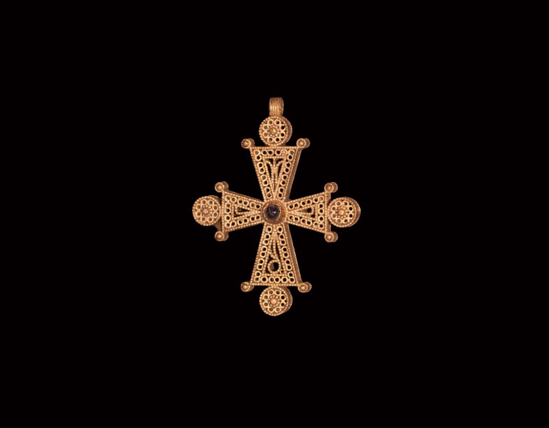 Post Medieval Gold Filigree Cross with Garnet
18th-19th century AD. A hollow go...