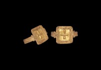 Byzantine Gold Ring with Cross
6th-7th century AD. A square bezel with ropework border and granule to each corner, raised cross motif to the centre, ...