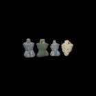 Romano-Egyptian Phallic and Grape Bunch Amulet Collection
1st century BC-1st century AD. A group of glazed composition amulets comprising: one grape ...