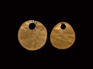 Egyptian Gold Earring Pair
Late Period, 664-332 BC. A pair of sheet gold disc earrings each with repoussé dots to the rim, suspension hole. 3.32 gram...