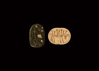 Phoenician Scaraboid Group
1st millennium BC. A group of two scaraboids, one with figure holding a frond and the other with a standing bull supportin...
