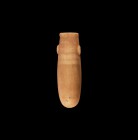 Egyptian Carved Alabastron
Late Period, 664-332 BC. A carved alabaster tubular vessel with rounded bottom, lateral lug handles, ribbed neck. 35 grams...