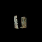 Egyptian Amulet Group
Late Period, 664-332 BC. A pair of two glazed composition amulets comprising: green glazed Anubis, wearing a striated kilt, pie...
