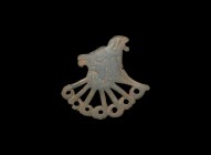 Scythian Bird of Prey Mount
1st millennium BC. A bronze strap slider with radiating bands; accompanied by an old scholarly note, typed and signed by ...