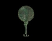 Large Scythian Mirror with Lion and Stag
5th-4th century BC. A bronze mirror, Scythian-Olbian type, with oval face with reflective surface; handle wi...