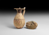 Greek Pottery Group
3rd century BC. A mixed ceramic group comprising: a jar with piriform body, broad flared rim with spurs to the rear and strap han...