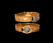 Parthian Gold Bracelet with Bull Frieze
1st century BC-1st century AD. A flat-section gold bracelet with braided gold wire to the edges, frieze of re...